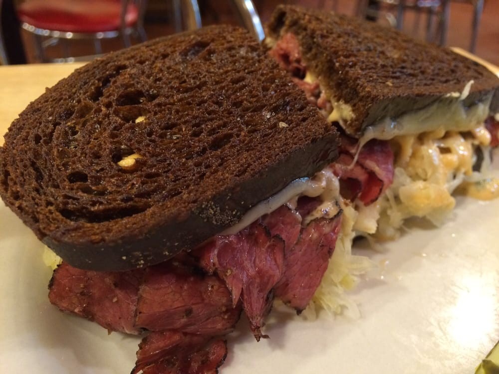 Cecil’s Deli signature dishes Reuben Sandwich, Matzo Ball Soup, Sasha’s Double Decker, Potato Knish